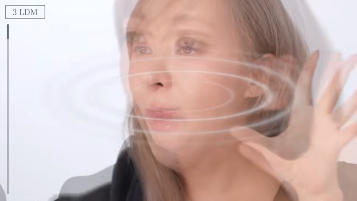 Video screenshot for LDM: an animation of ultrasound waves rippling across the YouTuber’s face